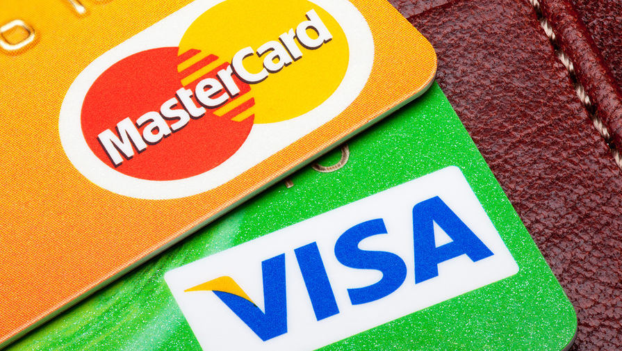 Нацбанк договаривается с Visa и Mastercard по вопросам обработки тенговых транзакций